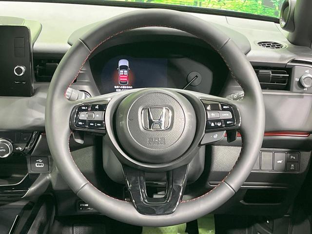 ヴェゼル e:HEV RS 登録済未使用車 プレミアムオーディオ 純正9型ナビ 全周囲カメラ レーダークルーズ 電動リアゲート ブラインドスポット ハーフレザーシート コーナーセンサー LEDヘッド ETC2.0 純正AW(15枚目)