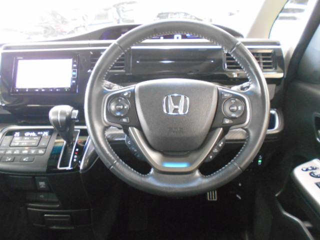 ステップワゴンスパーダ スパーダ・クールスピリットホンダセンシング　サイドエアバック　左右電動スライドドア　助手席エアバッグ　ドライブレコーダ　ＡＡＣ　横滑り防止機能　ターボ車　シートヒータ　ＡＢＳ　アクティブクルーズ　バックモニタ　地ＴＶ　ナビ＆ＴＶ　三列シート（14枚目）