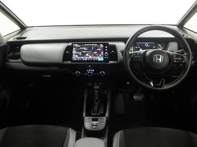 フィット ｅ：ＨＥＶＲＳ　禁煙車　エアバッグ　ナビ＆ＴＶ　パワーウィンドウ　助手席エアバッグ　Ｄレコ　フルセグテレビ　ＬＥＤヘッドランプ　セキュリティアラーム　フルオートエアコン　ＥＴＣ装備　スマートキ　パワーステアリング（14枚目）