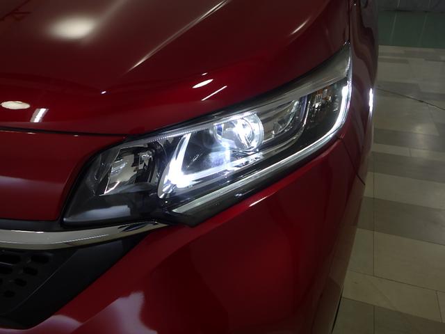 フリードハイブリッド ハイブリッド・Ｇホンダセンシング　ＬＥＤ・ＥＴＣ・スマートキー・リアカメラ・シートヒーター・１５ＡＷ・禁煙車・ベンチシート７人乗り　軽減ブレーキ　キーフリーシステム　電動格納式ドアミラー　１オ－ナ－　ＤＶＤ再生可能　ＥＣＯＮ　後カメラ（13枚目）