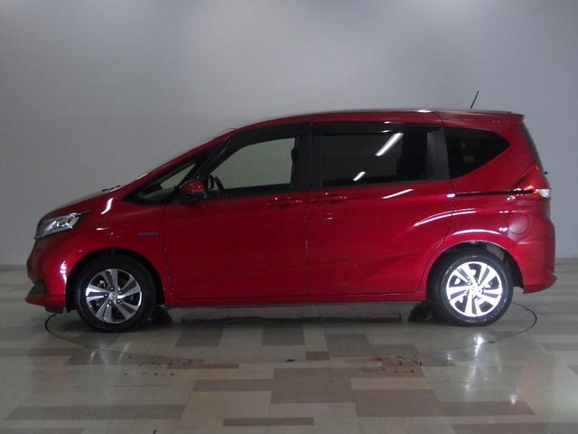 フリードハイブリッド ハイブリッド・Ｇホンダセンシング　ＬＥＤ・ＥＴＣ・スマートキー・リアカメラ・シートヒーター・１５ＡＷ・禁煙車・ベンチシート７人乗り　軽減ブレーキ　キーフリーシステム　電動格納式ドアミラー　１オ－ナ－　ＤＶＤ再生可能　ＥＣＯＮ　後カメラ（23枚目）