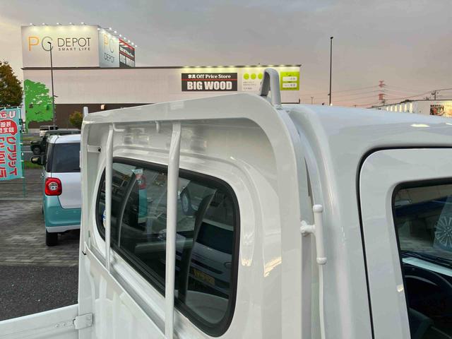 ハイゼットトラック スタンダード 荷台三方開 スマートアシスト 横滑り防止装置 前後コーナーセンサー アイドリングストップ オートライト オートハイビーム スピーカー一体型AM/FMラジオ サイドレバー式駐車ブレーキ バッテリーカバー(20枚目)