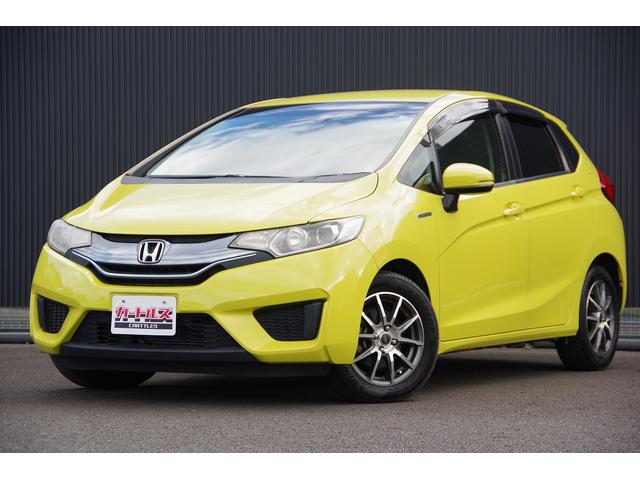 フィットハイブリッド Ｌパッケージ　電動格納式ミラー　ＡＵＴＯライト　ナビ＆ＴＶ　地デジフルセグＴＶ　ＵＳＢ　サイドエアバック　ＤＶＤ再生　バックカメラ　オートクルーズコントロール　イモビライザー　ＥＴＣ　ＥＳＣ　ＡＵＴＯエアコン（2枚目）