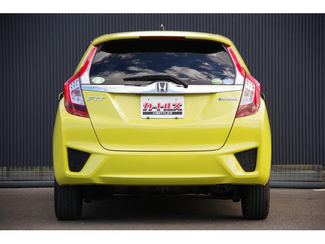 フィットハイブリッド Ｌパッケージ　電動格納式ミラー　ＡＵＴＯライト　ナビ＆ＴＶ　地デジフルセグＴＶ　ＵＳＢ　サイドエアバック　ＤＶＤ再生　バックカメラ　オートクルーズコントロール　イモビライザー　ＥＴＣ　ＥＳＣ　ＡＵＴＯエアコン（7枚目）