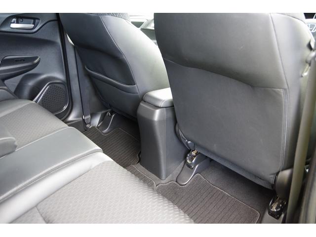 フィットハイブリッド Ｌパッケージ　電動格納式ミラー　ＡＵＴＯライト　ナビ＆ＴＶ　地デジフルセグＴＶ　ＵＳＢ　サイドエアバック　ＤＶＤ再生　バックカメラ　オートクルーズコントロール　イモビライザー　ＥＴＣ　ＥＳＣ　ＡＵＴＯエアコン（21枚目）
