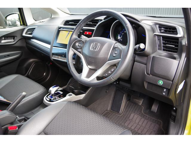 フィットハイブリッド Ｌパッケージ　電動格納式ミラー　ＡＵＴＯライト　ナビ＆ＴＶ　地デジフルセグＴＶ　ＵＳＢ　サイドエアバック　ＤＶＤ再生　バックカメラ　オートクルーズコントロール　イモビライザー　ＥＴＣ　ＥＳＣ　ＡＵＴＯエアコン（23枚目）