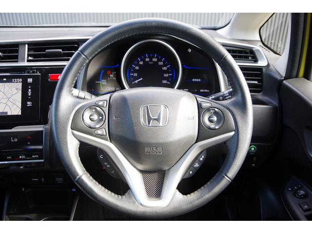 フィットハイブリッド Ｌパッケージ　電動格納式ミラー　ＡＵＴＯライト　ナビ＆ＴＶ　地デジフルセグＴＶ　ＵＳＢ　サイドエアバック　ＤＶＤ再生　バックカメラ　オートクルーズコントロール　イモビライザー　ＥＴＣ　ＥＳＣ　ＡＵＴＯエアコン（25枚目）