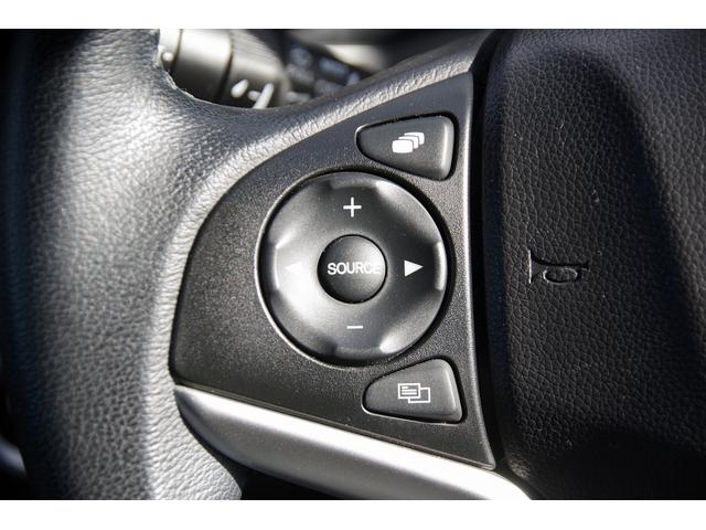 フィットハイブリッド Ｌパッケージ　電動格納式ミラー　ＡＵＴＯライト　ナビ＆ＴＶ　地デジフルセグＴＶ　ＵＳＢ　サイドエアバック　ＤＶＤ再生　バックカメラ　オートクルーズコントロール　イモビライザー　ＥＴＣ　ＥＳＣ　ＡＵＴＯエアコン（26枚目）