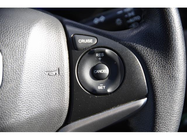 フィットハイブリッド Ｌパッケージ　電動格納式ミラー　ＡＵＴＯライト　ナビ＆ＴＶ　地デジフルセグＴＶ　ＵＳＢ　サイドエアバック　ＤＶＤ再生　バックカメラ　オートクルーズコントロール　イモビライザー　ＥＴＣ　ＥＳＣ　ＡＵＴＯエアコン（28枚目）