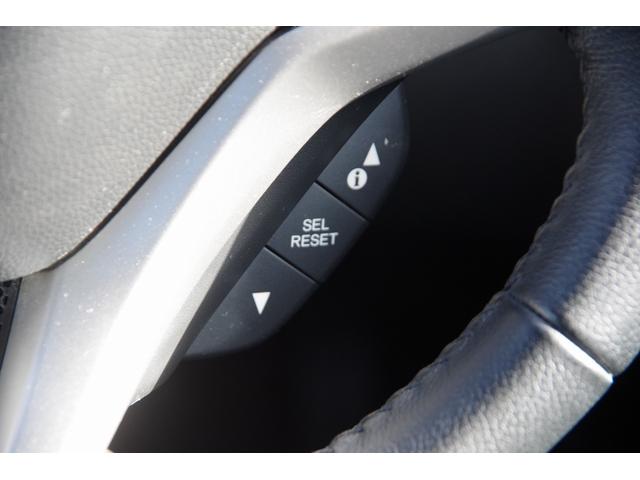 フィットハイブリッド Ｌパッケージ　電動格納式ミラー　ＡＵＴＯライト　ナビ＆ＴＶ　地デジフルセグＴＶ　ＵＳＢ　サイドエアバック　ＤＶＤ再生　バックカメラ　オートクルーズコントロール　イモビライザー　ＥＴＣ　ＥＳＣ　ＡＵＴＯエアコン（29枚目）