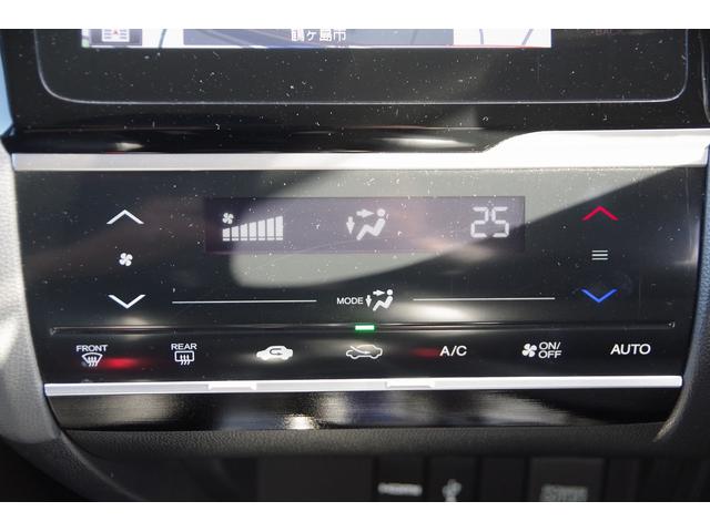 フィットハイブリッド Ｌパッケージ　電動格納式ミラー　ＡＵＴＯライト　ナビ＆ＴＶ　地デジフルセグＴＶ　ＵＳＢ　サイドエアバック　ＤＶＤ再生　バックカメラ　オートクルーズコントロール　イモビライザー　ＥＴＣ　ＥＳＣ　ＡＵＴＯエアコン（40枚目）