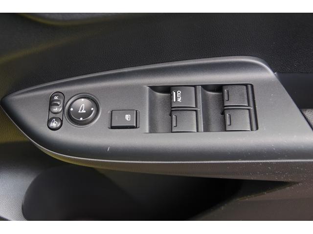 フィットハイブリッド Ｌパッケージ　電動格納式ミラー　ＡＵＴＯライト　ナビ＆ＴＶ　地デジフルセグＴＶ　ＵＳＢ　サイドエアバック　ＤＶＤ再生　バックカメラ　オートクルーズコントロール　イモビライザー　ＥＴＣ　ＥＳＣ　ＡＵＴＯエアコン（45枚目）