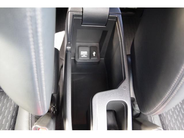 フィットハイブリッド Ｌパッケージ　電動格納式ミラー　ＡＵＴＯライト　ナビ＆ＴＶ　地デジフルセグＴＶ　ＵＳＢ　サイドエアバック　ＤＶＤ再生　バックカメラ　オートクルーズコントロール　イモビライザー　ＥＴＣ　ＥＳＣ　ＡＵＴＯエアコン（50枚目）