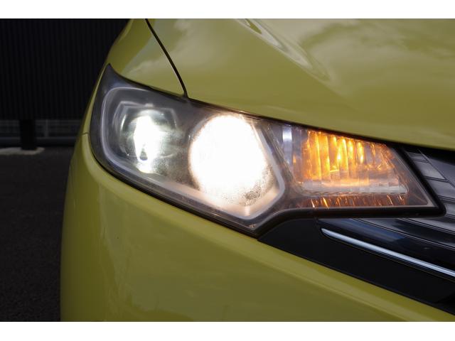 フィットハイブリッド Ｌパッケージ　電動格納式ミラー　ＡＵＴＯライト　ナビ＆ＴＶ　地デジフルセグＴＶ　ＵＳＢ　サイドエアバック　ＤＶＤ再生　バックカメラ　オートクルーズコントロール　イモビライザー　ＥＴＣ　ＥＳＣ　ＡＵＴＯエアコン（55枚目）