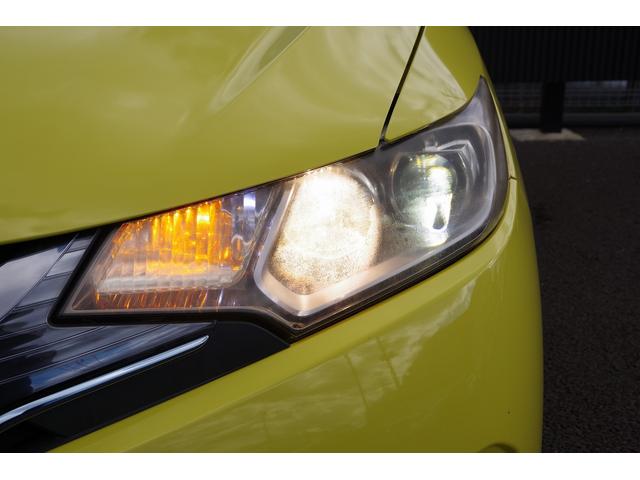 フィットハイブリッド Ｌパッケージ　電動格納式ミラー　ＡＵＴＯライト　ナビ＆ＴＶ　地デジフルセグＴＶ　ＵＳＢ　サイドエアバック　ＤＶＤ再生　バックカメラ　オートクルーズコントロール　イモビライザー　ＥＴＣ　ＥＳＣ　ＡＵＴＯエアコン（56枚目）