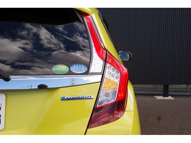 フィットハイブリッド Ｌパッケージ　電動格納式ミラー　ＡＵＴＯライト　ナビ＆ＴＶ　地デジフルセグＴＶ　ＵＳＢ　サイドエアバック　ＤＶＤ再生　バックカメラ　オートクルーズコントロール　イモビライザー　ＥＴＣ　ＥＳＣ　ＡＵＴＯエアコン（60枚目）
