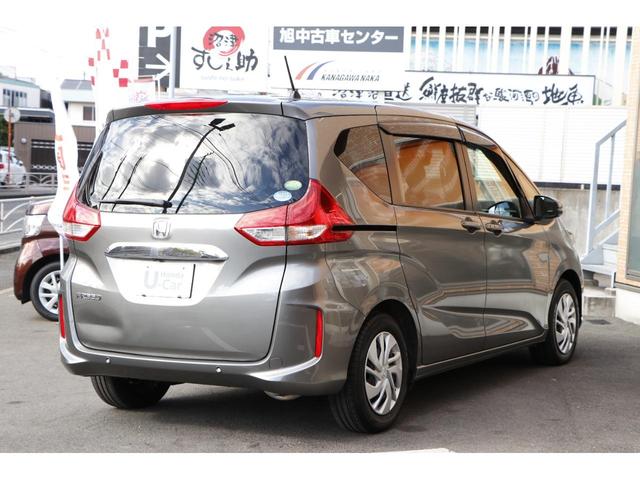 フリード Ｇ・ホンダセンシング　ワンオーナー　純正ナビ　純正前後ドラレコ　運転席助手席シートヒーター　ＬＥＤヘッドライト　両側電動スライドドア　６人乗り（4枚目）
