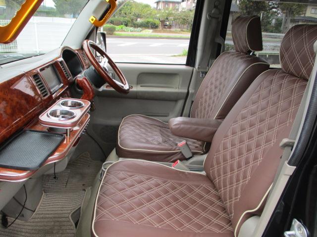 スクラムワゴン ＰＺターボ　車検令和８年３月　ドレスアップ車　ＳＤナビ　地デジフルセグテレビ　ＣＤ　ＤＶＤ　Ｂｌｕｅｔｏｏｔｈオーディオ　左パワースライドドア　ウッドパネル　茶革調シート　テーブル　社外マフラー　ＬＥＤフォグ（5枚目）