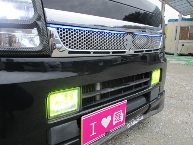 スクラムワゴン ＰＺターボ　車検令和８年３月　ドレスアップ車　ＳＤナビ　地デジフルセグテレビ　ＣＤ　ＤＶＤ　Ｂｌｕｅｔｏｏｔｈオーディオ　左パワースライドドア　ウッドパネル　茶革調シート　テーブル　社外マフラー　ＬＥＤフォグ（17枚目）