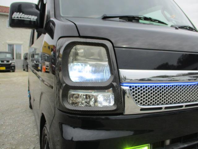 スクラムワゴン ＰＺターボ　車検令和８年３月　ドレスアップ車　ＳＤナビ　地デジフルセグテレビ　ＣＤ　ＤＶＤ　Ｂｌｕｅｔｏｏｔｈオーディオ　左パワースライドドア　ウッドパネル　茶革調シート　テーブル　社外マフラー　ＬＥＤフォグ（27枚目）