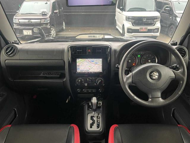 ジムニー クロスアドベンチャー　ワンオーナー　禁煙車　ターボ　ルーフキャリア　社外サス　純正１６インチＡＷ　ジオランダーオフロードタイヤ　Ｐａｎａｓｏｎｉｃ製ＳＤナビ　ワンセグＴＶ　シートヒーター　キーレス　電動格納ミラー（2枚目）