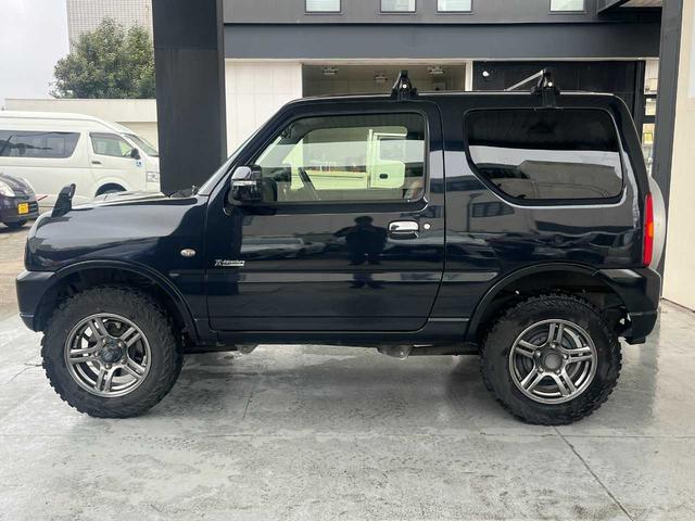 ジムニー クロスアドベンチャー　ワンオーナー　禁煙車　ターボ　ルーフキャリア　社外サス　純正１６インチＡＷ　ジオランダーオフロードタイヤ　Ｐａｎａｓｏｎｉｃ製ＳＤナビ　ワンセグＴＶ　シートヒーター　キーレス　電動格納ミラー（22枚目）