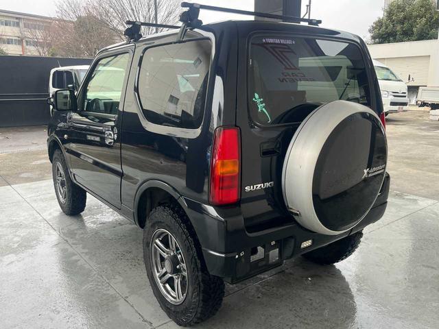 ジムニー クロスアドベンチャー　ワンオーナー　禁煙車　ターボ　ルーフキャリア　社外サス　純正１６インチＡＷ　ジオランダーオフロードタイヤ　Ｐａｎａｓｏｎｉｃ製ＳＤナビ　ワンセグＴＶ　シートヒーター　キーレス　電動格納ミラー（23枚目）