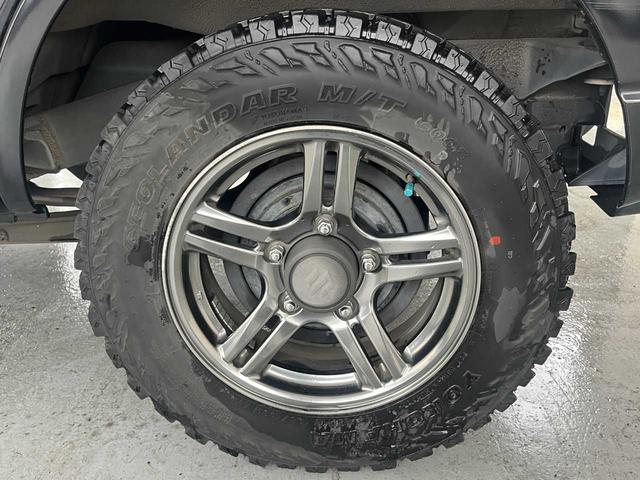 ジムニー クロスアドベンチャー　ワンオーナー　禁煙車　ターボ　ルーフキャリア　社外サス　純正１６インチＡＷ　ジオランダーオフロードタイヤ　Ｐａｎａｓｏｎｉｃ製ＳＤナビ　ワンセグＴＶ　シートヒーター　キーレス　電動格納ミラー（28枚目）