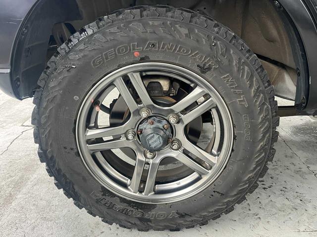 ジムニー クロスアドベンチャー　ワンオーナー　禁煙車　ターボ　ルーフキャリア　社外サス　純正１６インチＡＷ　ジオランダーオフロードタイヤ　Ｐａｎａｓｏｎｉｃ製ＳＤナビ　ワンセグＴＶ　シートヒーター　キーレス　電動格納ミラー（29枚目）