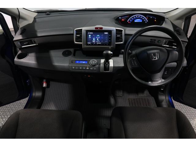 フリード Gジャストセレクション 認定中古車 1年保証付 ワンオーナー ナビ Bカメラ ETC エコモード Bモニター スマトキー 地上デジタルTV ワンオナ 助手席エアバッグ オートエアコン パワステ 両側スライド片側電動 PW(8枚目)