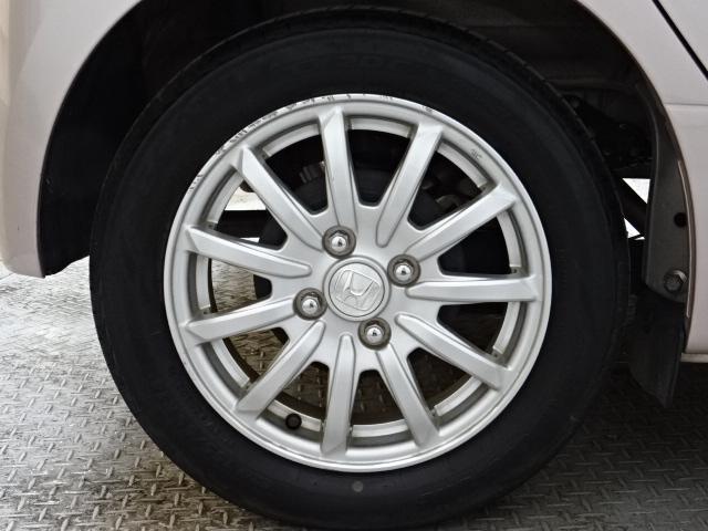 １５５−６５−１４タイヤと純正アルミホイールです。