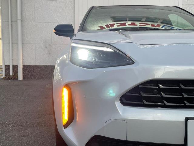 ヤリスクロス ハイブリッドZ 禁煙車 全周囲カメラ トヨタセーフティセンス レーダークルーズ ハーフレザーシート ドラレコ コーナーセンサー LEDヘッド ビルトインETC 純正18インチアルミ オートライト デュアルエアコン(12枚目)