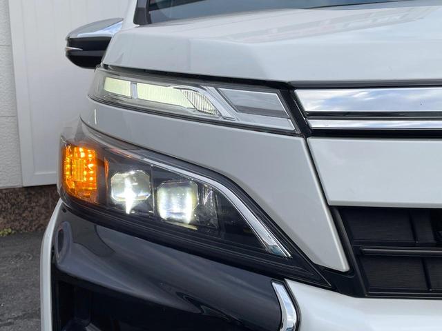 ヴォクシー ＺＳ　煌ＩＩ　両側電動ドア　純正ＳＤナビ　後席モニター　バックカメラ　衝突被害軽減システム　スマートキー　ＬＥＤヘッド　ビルトインＥＴＣ　クルコン　純正１６インチアルミ　オートハイビーム　車線逸脱警報（13枚目）