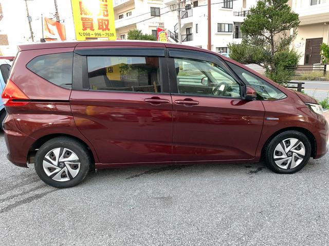 フリードハイブリッド ハイブリッド・Gホンダセンシング 本土仕入・両側パワースライドドア・純正9インチナビ・バックモニター・フルセグTV・DVD・Bluetooth・ホンダセンシング・ビルトインETC・LEDヘッドライト(9枚目)