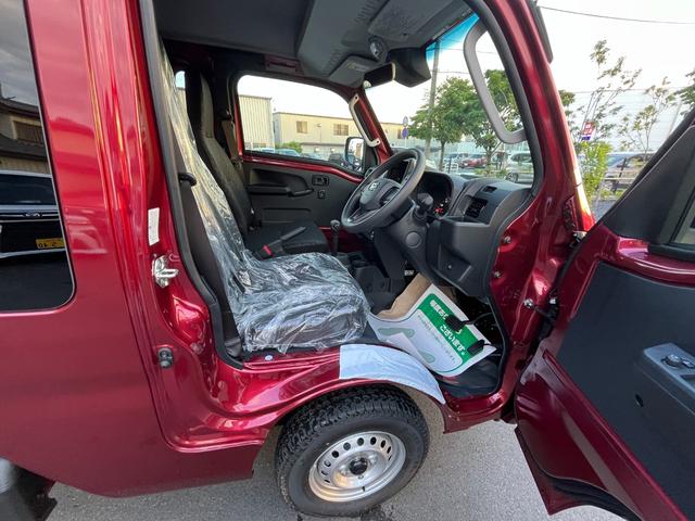 ハイゼットトラック ジャンボエクストラ　届出済未使用車　ＡＴ　４ＷＤ　ＬＥＤヘッドライト　ＬＥＤフォグライト　ＬＥＤ荷台作業灯　電動格納リモコンドアミラー　リヤゲートチェーン　ドアポケット　リクライニング機構　ファブリックシート（20枚目）