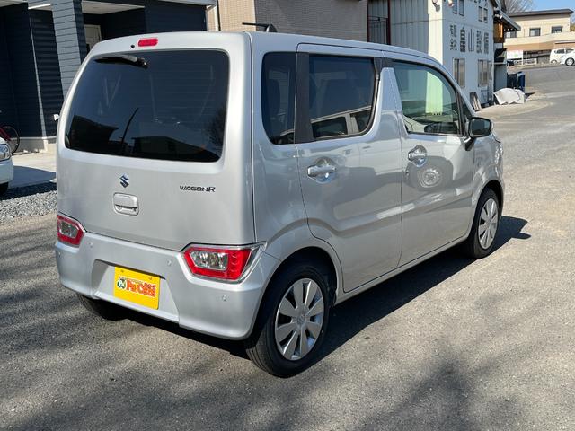 ワゴンＲ ＦＸ　届出済未使用車　運転席シートヒーター　パーキングソナー　衝突軽減ブレーキサポート　運転席助手席エアバック　キーレスエントリーシステム　セキュリティアラーム　フルフラット　オートハイビーム　オートライト（9枚目）