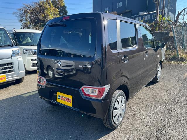 ワゴンＲ ＦＸ　届出済未使用車　運転席シートヒーター　パーキングソナー　衝突軽減ブレーキサポート　運転席助手席エアバック　キーレスエントリーシステム　セキュリティアラーム　フルフラット　オートハイビーム　オートライト（9枚目）