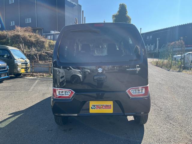 ワゴンＲ ＦＸ　届出済未使用車　運転席シートヒーター　パーキングソナー　衝突軽減ブレーキサポート　運転席助手席エアバック　キーレスエントリーシステム　セキュリティアラーム　フルフラット　オートハイビーム　オートライト（10枚目）