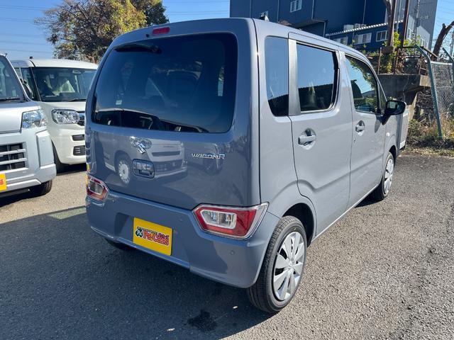 ワゴンＲ ＦＸ　届出済未使用車　運転席シートヒーター　パーキングソナー　衝突軽減ブレーキサポート　運転席助手席エアバック　キーレスエントリーシステム　セキュリティアラーム　フルフラット　オートハイビーム　オートライト（9枚目）