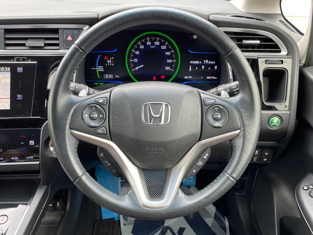 シャトル ハイブリッドZ 純正ナビ バックカメラ 禁煙車 ハーフレザーシート スマートキー LEDヘッド ETC クルコン オートマチックハイビーム オートライト オートエアコン 純正16インチAW Bluetooth再生(10枚目)