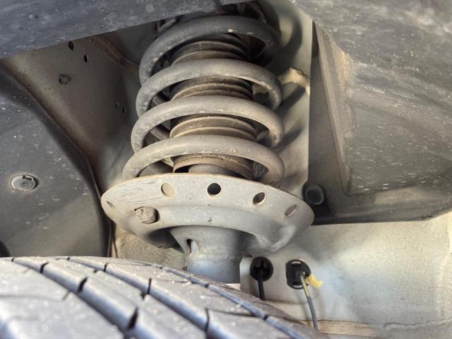 フリードハイブリッド ハイブリッド プレミアムエディション 両側電動スライドドア 純正ナビ バックカメラ 禁煙車 スマートキー ETC クルコン オートライト オートエアコン Bluetooth CD/DVD再生 フルセグ 革巻きステアリング(21枚目)