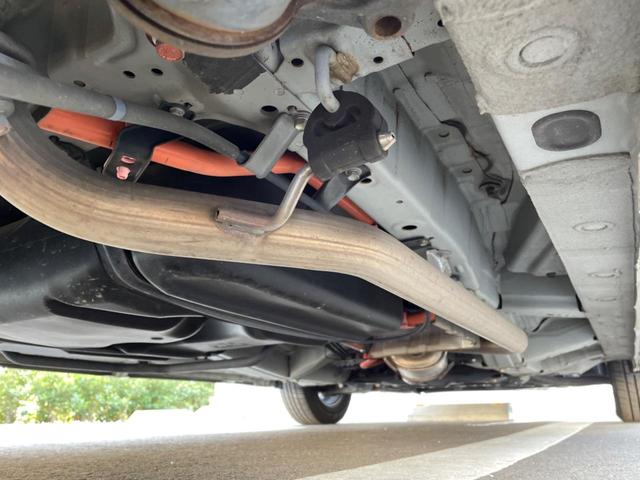 フリードハイブリッド ハイブリッド プレミアムエディション 両側電動スライドドア 純正ナビ バックカメラ 禁煙車 スマートキー ETC クルコン オートライト オートエアコン Bluetooth CD/DVD再生 フルセグ 革巻きステアリング(24枚目)