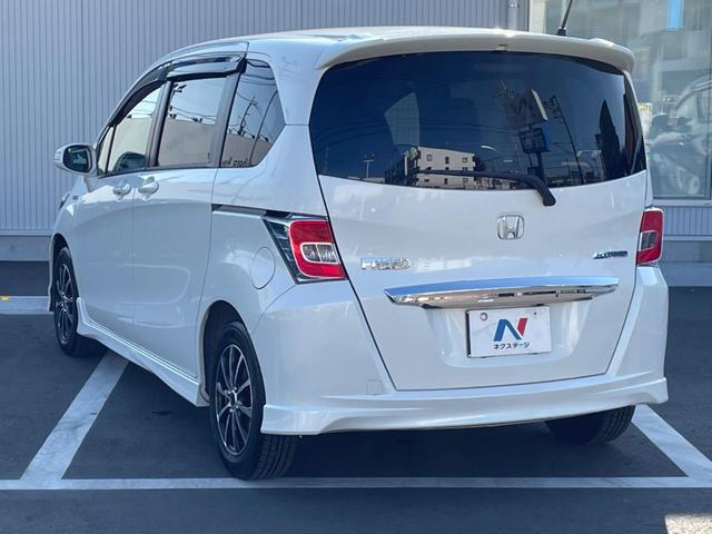 フリードハイブリッド ハイブリッド プレミアムエディション 両側電動スライドドア 純正ナビ バックカメラ 禁煙車 スマートキー ETC クルコン オートライト オートエアコン Bluetooth CD/DVD再生 フルセグ 革巻きステアリング(27枚目)