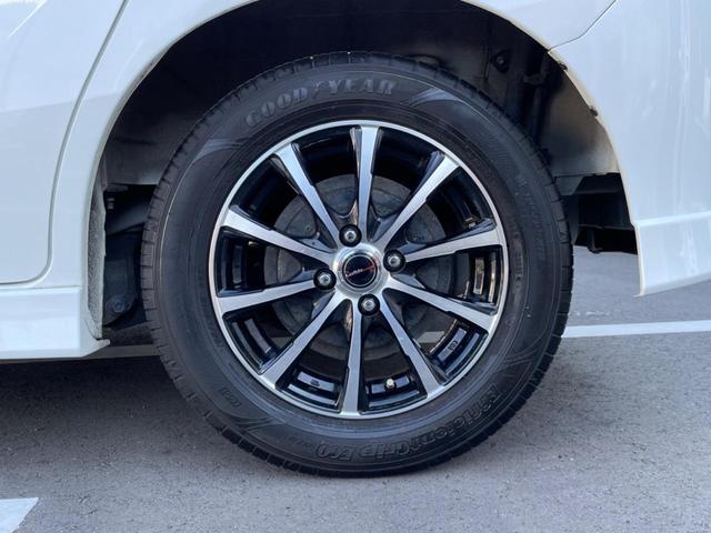 フリードハイブリッド ハイブリッド プレミアムエディション 両側電動スライドドア 純正ナビ バックカメラ 禁煙車 スマートキー ETC クルコン オートライト オートエアコン Bluetooth CD/DVD再生 フルセグ 革巻きステアリング(29枚目)