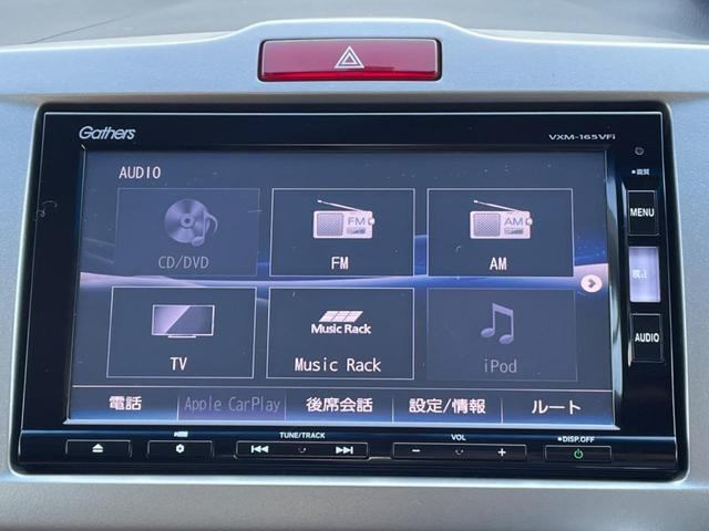 フリードハイブリッド ハイブリッド プレミアムエディション 両側電動スライドドア 純正ナビ バックカメラ 禁煙車 スマートキー ETC クルコン オートライト オートエアコン Bluetooth CD/DVD再生 フルセグ 革巻きステアリング(32枚目)