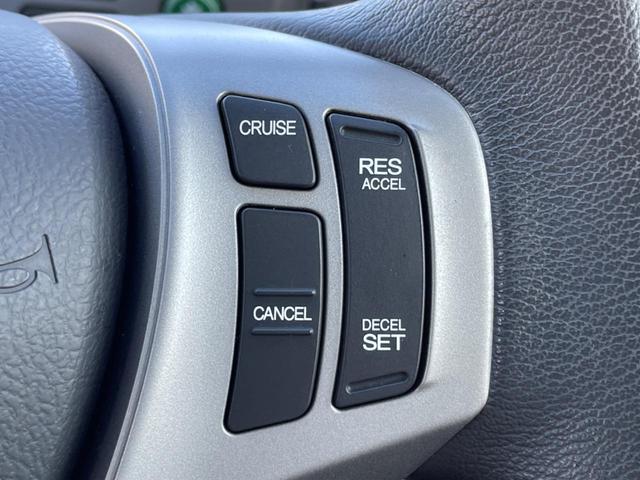 フリードハイブリッド ハイブリッド プレミアムエディション 両側電動スライドドア 純正ナビ バックカメラ 禁煙車 スマートキー ETC クルコン オートライト オートエアコン Bluetooth CD/DVD再生 フルセグ 革巻きステアリング(35枚目)