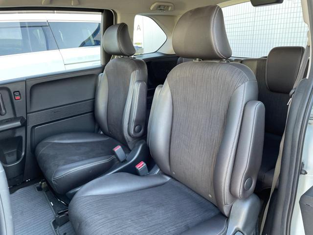 フリードハイブリッド ハイブリッド プレミアムエディション 両側電動スライドドア 純正ナビ バックカメラ 禁煙車 スマートキー ETC クルコン オートライト オートエアコン Bluetooth CD/DVD再生 フルセグ 革巻きステアリング(38枚目)