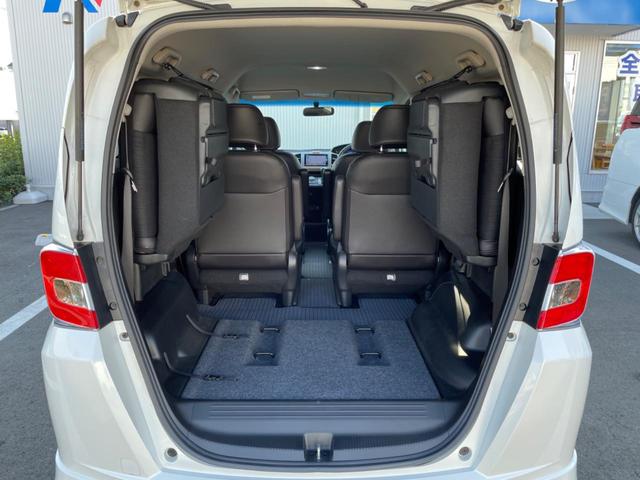 フリードハイブリッド ハイブリッド プレミアムエディション 両側電動スライドドア 純正ナビ バックカメラ 禁煙車 スマートキー ETC クルコン オートライト オートエアコン Bluetooth CD/DVD再生 フルセグ 革巻きステアリング(41枚目)