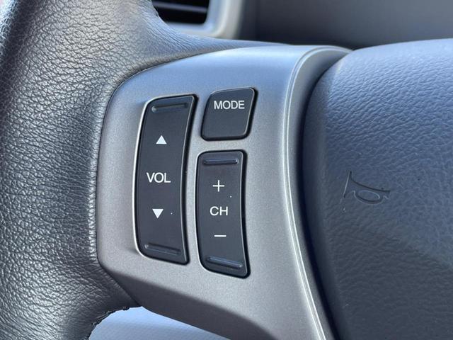 フリードハイブリッド ハイブリッド プレミアムエディション 両側電動スライドドア 純正ナビ バックカメラ 禁煙車 スマートキー ETC クルコン オートライト オートエアコン Bluetooth CD/DVD再生 フルセグ 革巻きステアリング(49枚目)