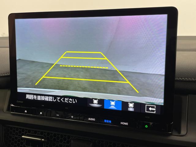 ステップワゴン ｅ：ＨＥＶスパーダ　禁煙車　登録済未使用車　両側パワースライドドア　ホンダコネクトナビ　アップルカープレイ　フルセグ　バックカメラ　ビルトインＥＴＣ　ハーフレザーシート　アダクティブクルーズコントロール　シートヒーター（3枚目）